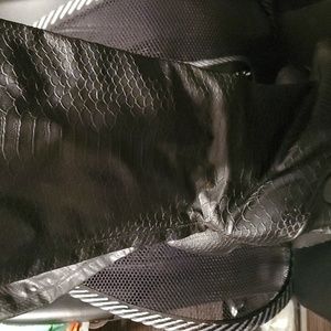 JustFab faux leathe black platform and textured boot.